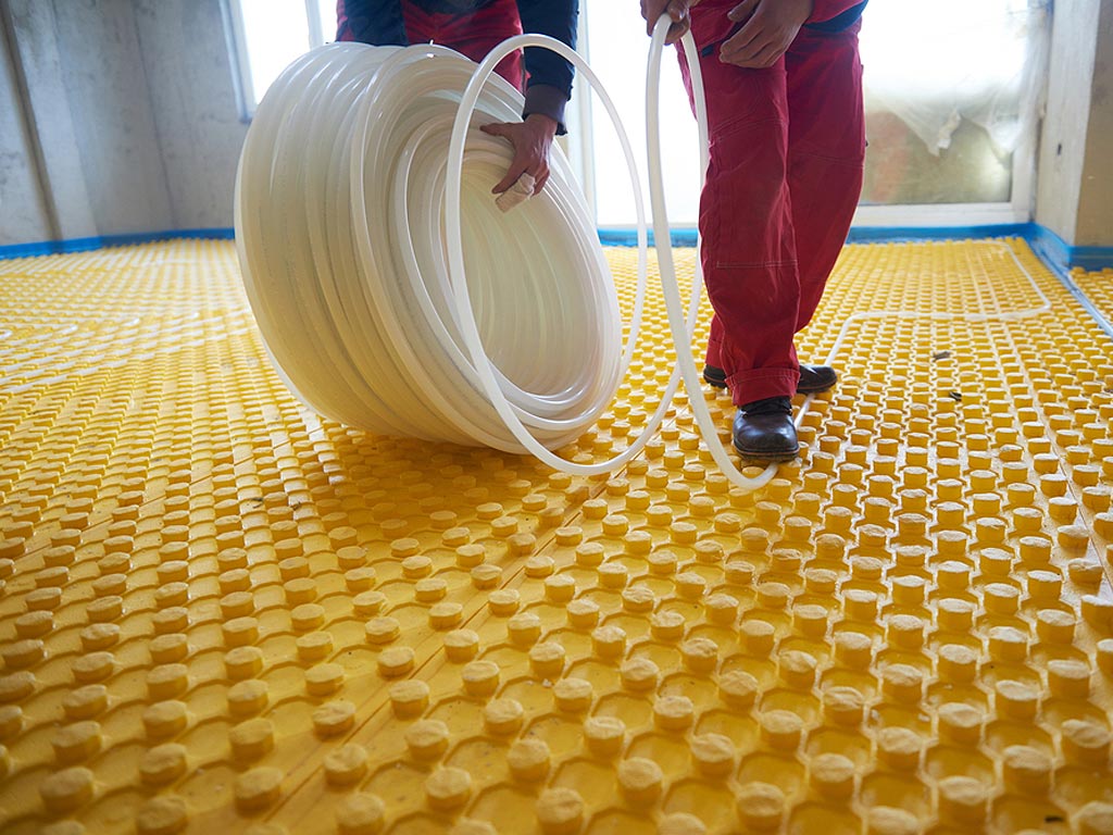 Radiant Heat Contractor Laying Radiant Heat Floor