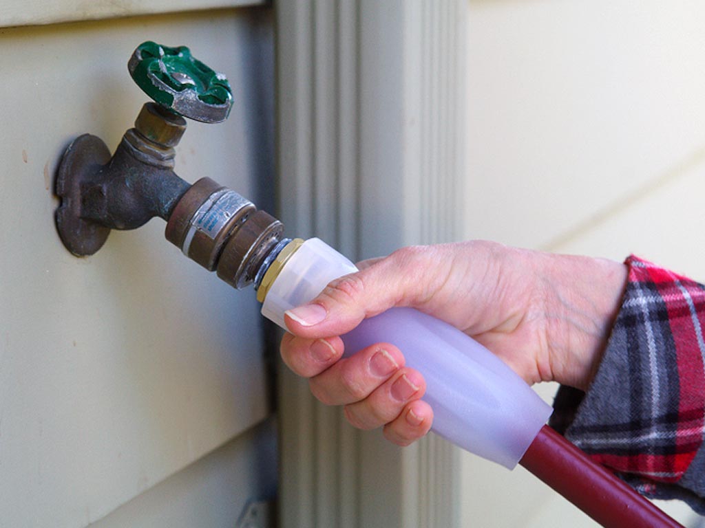 Outdoor Spout Calling A Summer Plumber